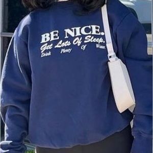 Sporty and rich navy sweater drink a lot of water!